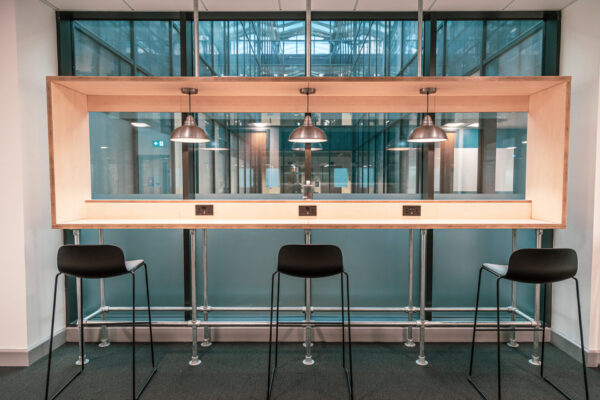 Bar working area, with high stools looking over the central atrium