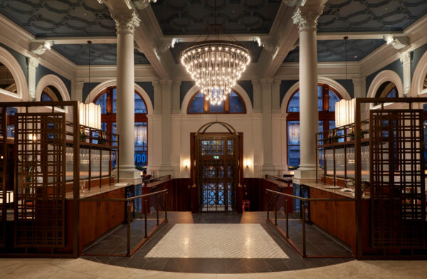Main hotel lobby entrance, with large chandelier over restored interior